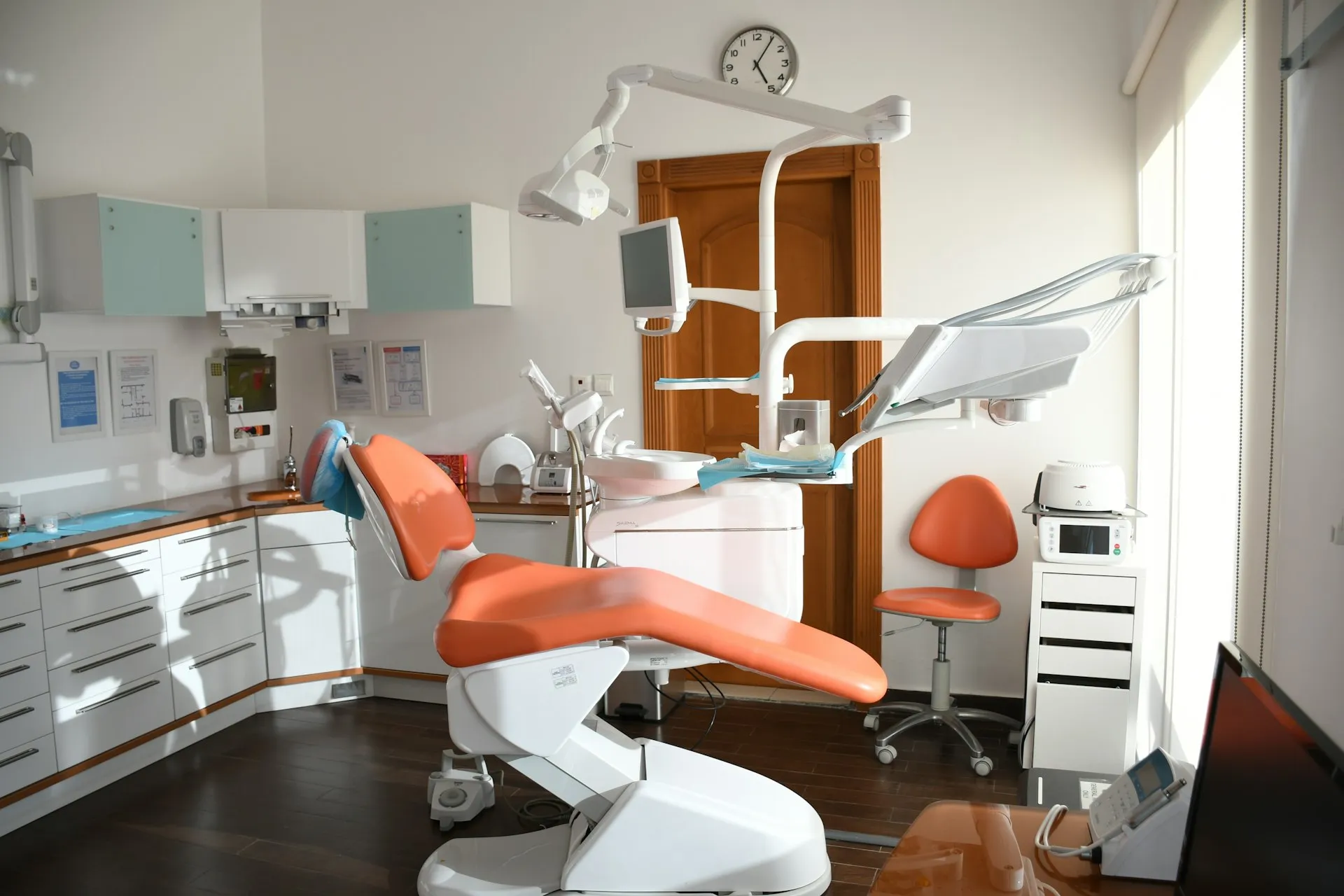 Dental chair and equipment in a clean treatment room